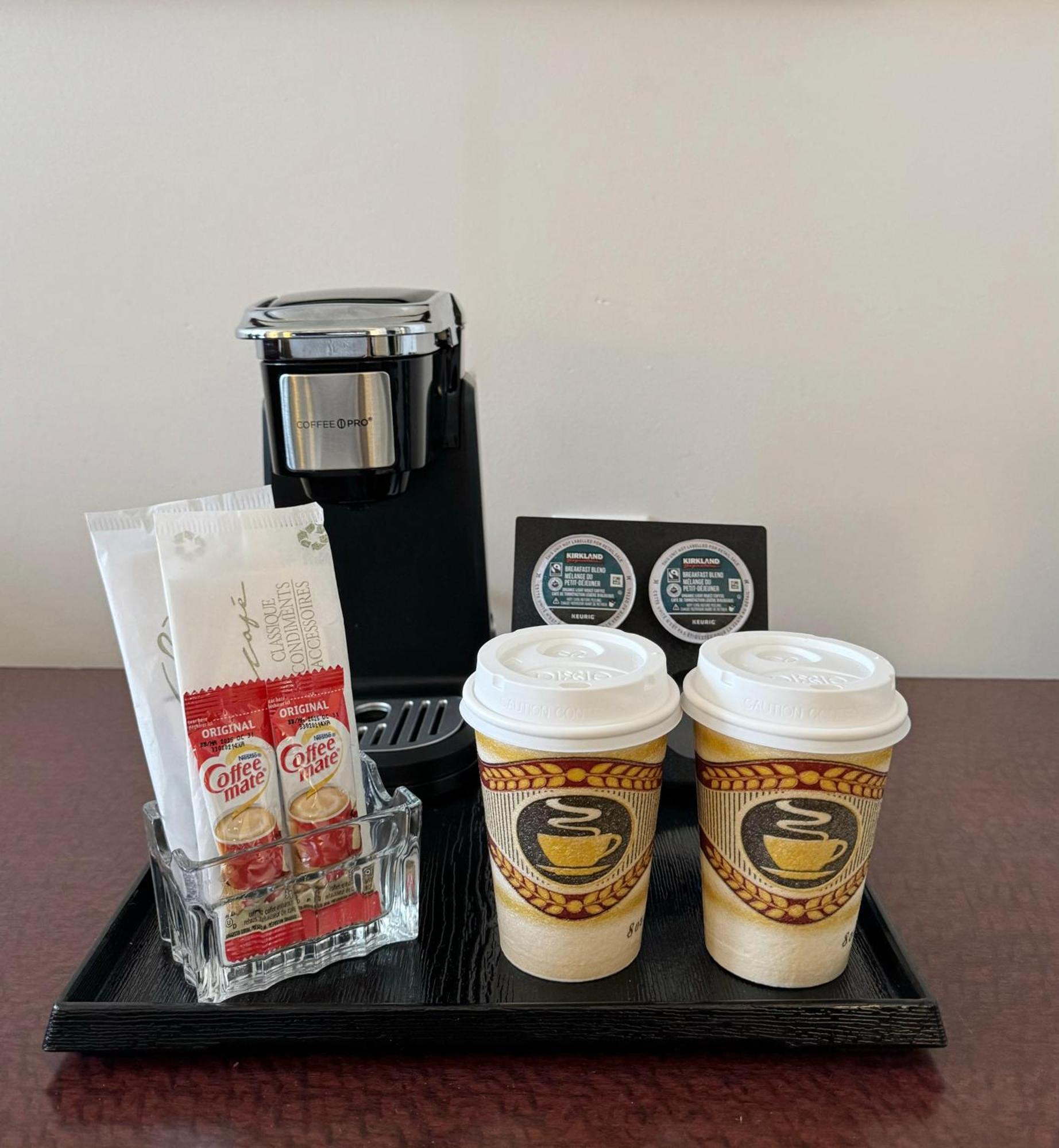 ホテル Divya Sutra Plaza And Conference Centre Calgary Airport エクステリア 写真